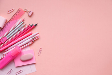 Stationary concept, Flat Lay top view Photo of school supplies scissors, pencils, paper clips,calculator,sticky note,stapler and notepad in pastel tone on pink background with copy space, flat lay. - 437337550