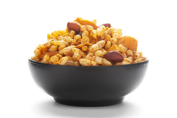 Close up of very spicy sweet Fatafat Bhel mixture Indian namkeen (snacks) on a ceramic black bowl.