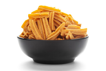 Close up of salted Soya Sticks Indian namkeen (snacks) on a ceramic black bowl.