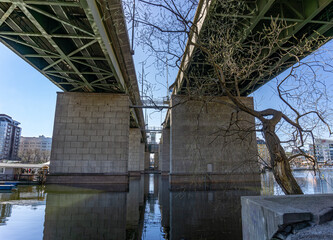 A space under the bridge with main road on it