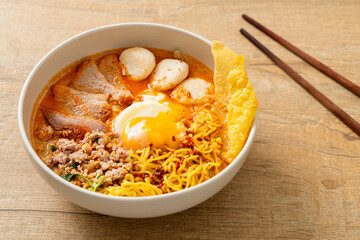 egg noodles with pork and meatball in spicy soup