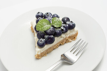 cheese pie with berries white background
