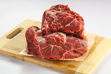 Raw beef neck over board