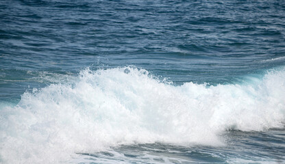 Tropical blue ocean in Hawaii. Summer sea in clean and clear water from surface for background. Waves concept design.