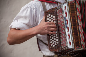 Musician in typical costume during an autumn local celebration in Val Isarco ( South Tirol )