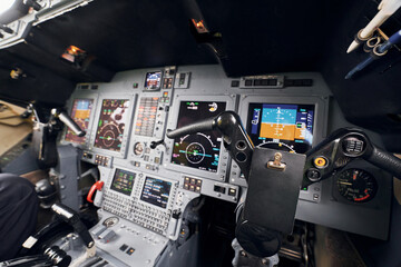 Different displays. Close up focused view of airplane cockpit