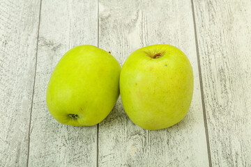 Two ripe green sweet apples