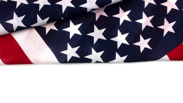 Moving picture of american flag flat lay isolated on white. Presidents day, 4th of july, veterans day, Labour Day, Memorial Day, celebration concept. Flag of the US. Template for web, social media.