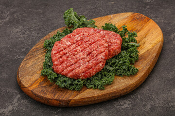 Raw beef burger cutlet for cooking