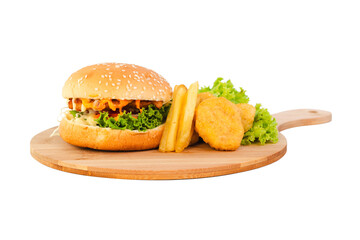 Chicken hamburger with nuggets and french fries on a wooden plate over white background