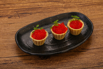 Apetizer - tartlet with red caviar