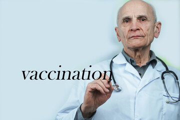Mature doctor with stethoscope on medical white coat writes vaccination word