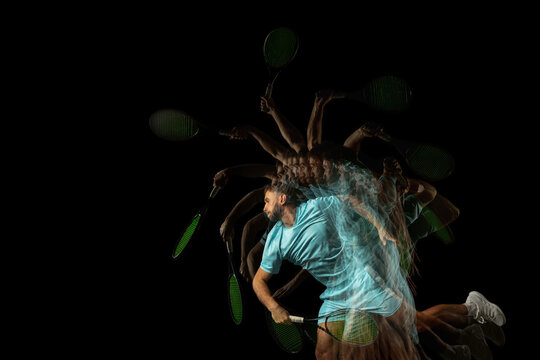 One man, professional tennis player isolated on black background in mixed neon light. Stroboscope