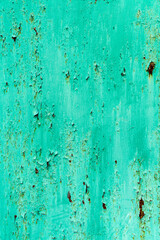 photo of metal with old paint. rust under the paint.