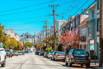 Beautiful street with townhouses in San Francisco famous architecture. San Francisco, USA - 17 Apr 2021
