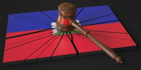 Block with flag of Haiti hit by judge's gavel. Court related 3d rendering