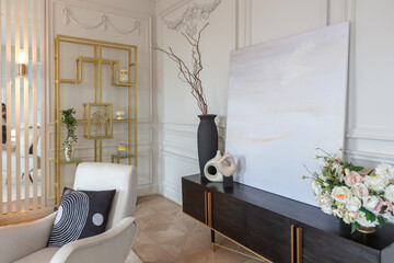 rich luxurious interior of a cozy room with modern stylish furniture nd grand piano, decorated with baroque columns and stucco on the walls