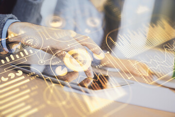 Double exposure of tech theme hologram and man and woman working together holding and using a mobile device.