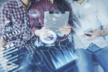 Double exposure of tech theme hologram and man and woman working together holding and using a mobile device.