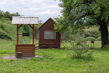 Water well and wooden gazebo 