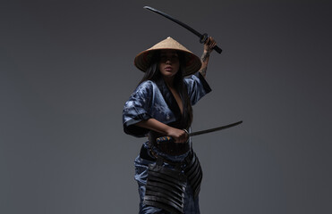 Eastern woman samurai with kasa and katanas