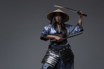 Eastern woman samurai with kasa and katanas