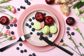 Concept of delicious eating on pink background