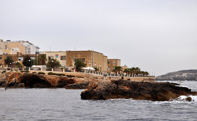 Photo of the buildings, the promenade and the rocky shore of Buggiba, Malta, Europe. Picture taken...