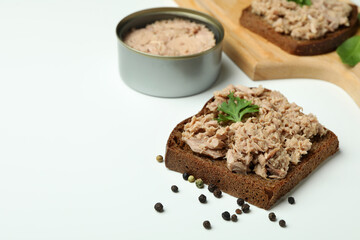 Tasty tuna sandwiches on white background, space for text