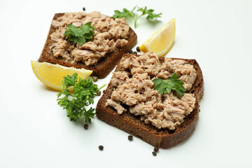 Sandwiches with canned tuna on white background