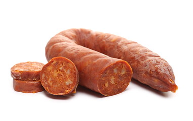 Fermented semi-hard dried spicy sausage slices, pig meat isolated on white background