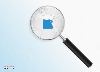 Magnifier with map of Egypt on abstract topographic background.
