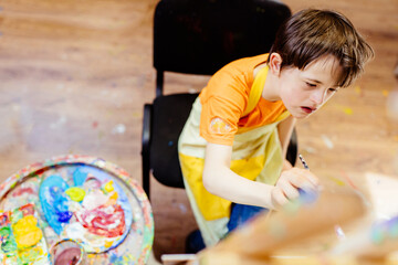 Education for special child concept. Disabled kid learning, art therapy concept. Top view of...
