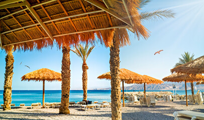 Morning on sandy beach in Eilat - famous tourist resort and recreation city in Israel