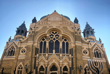 Low angle of the historical Szeged Synagogue under the blue sky in Hungary