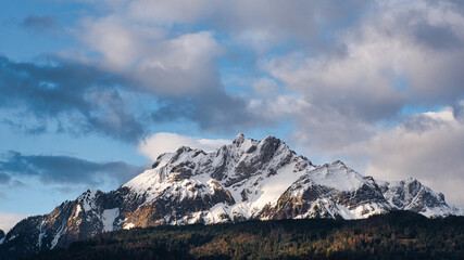 Fototapeta premium Mount Pilatus with snow in the Swiss Alps on a cloudy day
