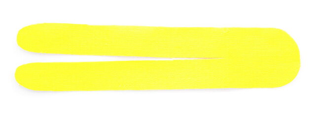 Yellow kinesio tape piece on white background, top view