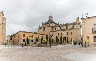 Fototapeta na wymiar Front view at the Iglesia de Cerralbo, dome copula tower at the iconic spanish Romanesque and Renaissance architecture, Plaza Mazarrasa, downtown city