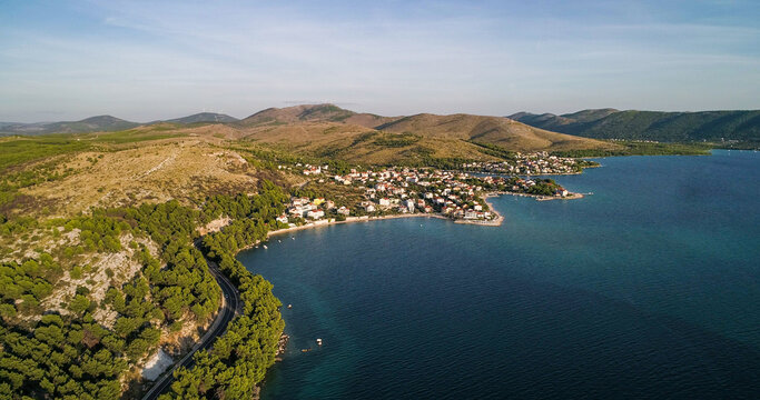 aerial, drone shot, parallel to the mediterranean shore and above the adriatic sea, towards the Zabo