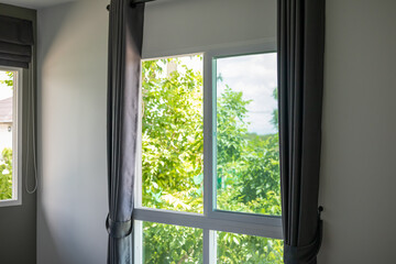 Fototapeta na wymiar Curtain window interior decoration in bed room