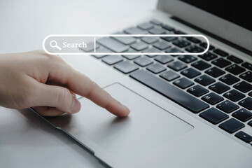 Searching. business people hand working on laptop computer on desk at home office, investment,...