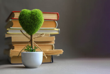 ecology recycle concept with green tree and books
