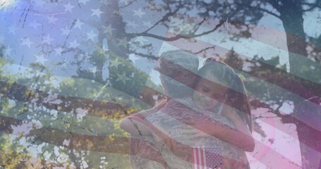 Composition of male soldier embracing smiling daughter over american flag