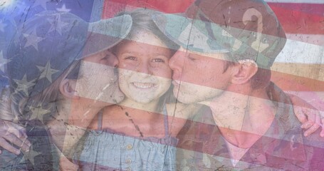 Composition of male and female soldiers kissing smiling daughter over american flag