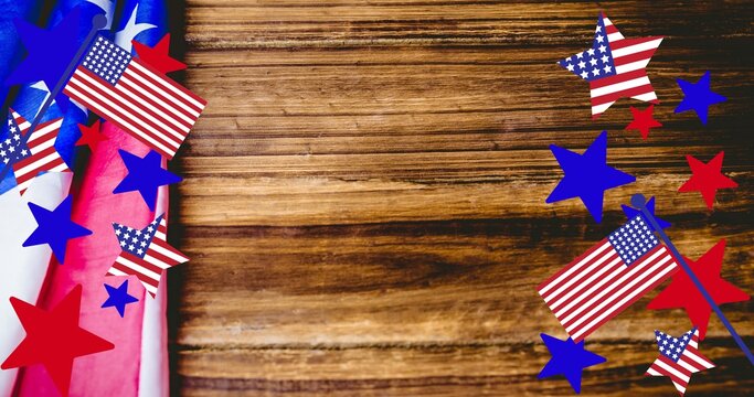 Composition of american flag on wooden table over american flag decorations