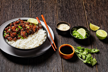 Cauliflower wings with rice on a bowl, close-up