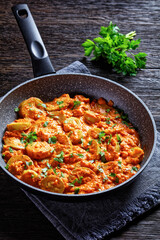 zucchini in a creamy tomato sauce, top view