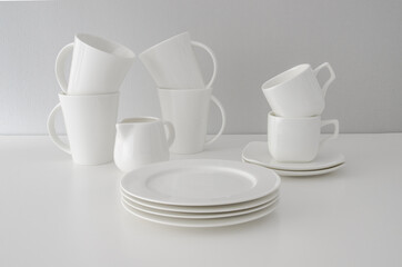 Set of white utensils on isolated background