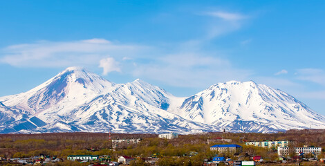 Avachinsky volcano towers over the city of Petropavlovsk-Kamchatsky on the Kamchatka Peninsula