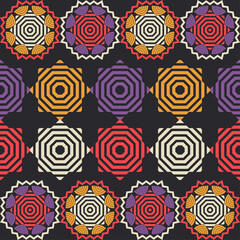 Mandala. Ethnic mandala with colorful tribal ornaments. Seamless pattern. Design with manual hatching. Isolated. Vector illustration for web design or print.